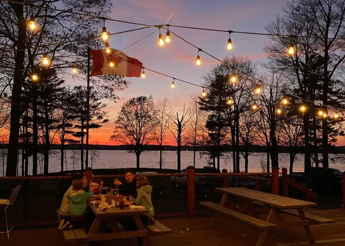 POV of Sunset over Stoco Lake from Stoco Lake Lodge's Patio in Tweed, Ontario 